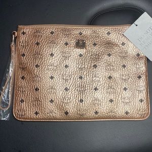 Rose gold mcm purse never used